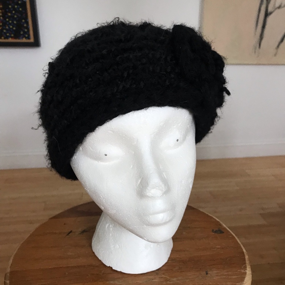 Hand knitted soft wool hat with flower